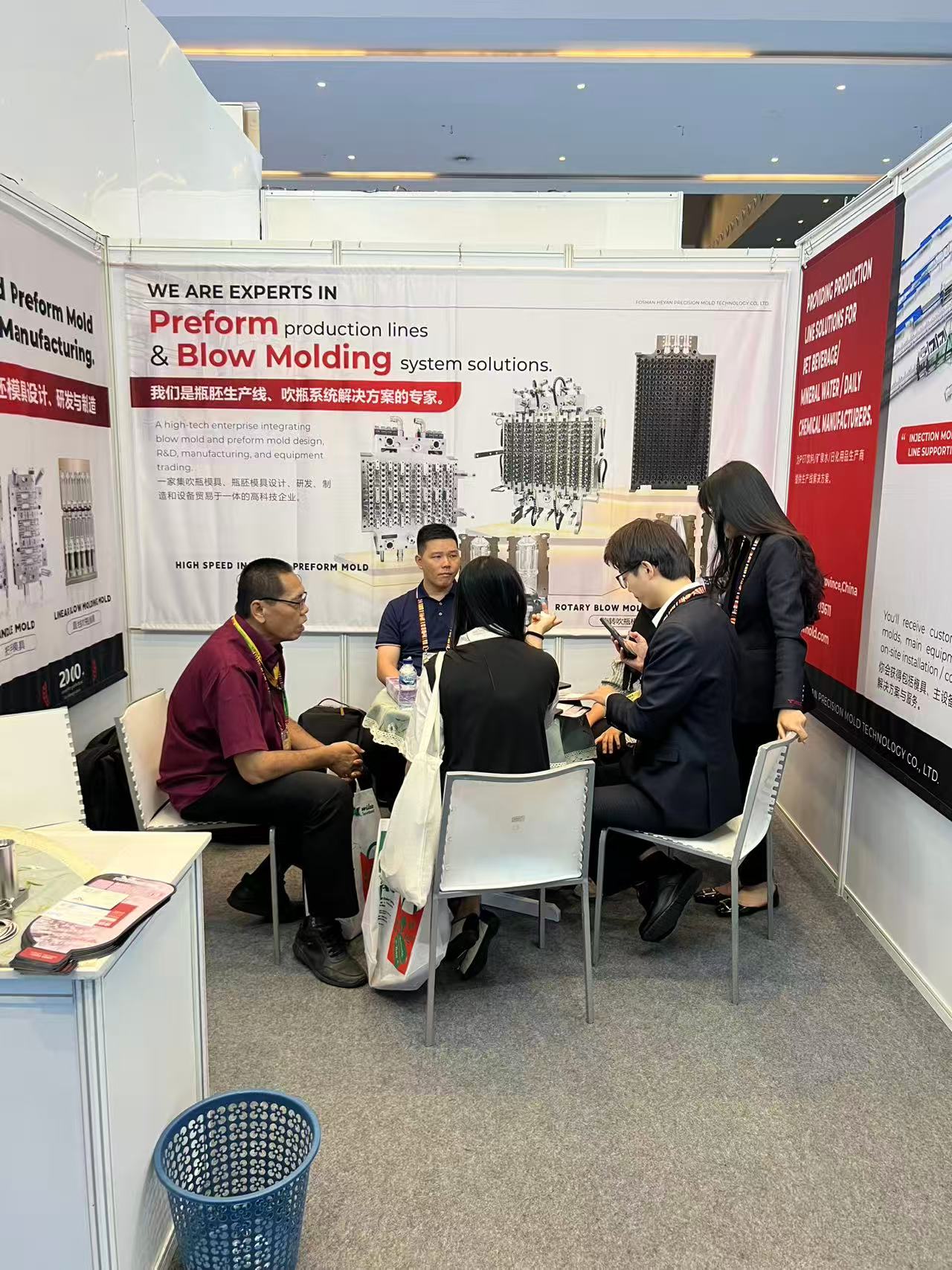Heyan sales staff meeting a packaging producer at booth C3T320, ALLPACK Indonesia 2026